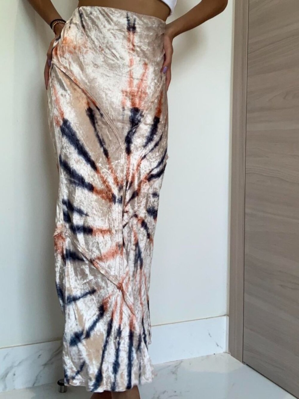Free People maxi skirt in a soft velvet fabric with a striking spiral tie-dye pr